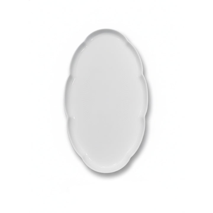 White ceramic plate on a white background