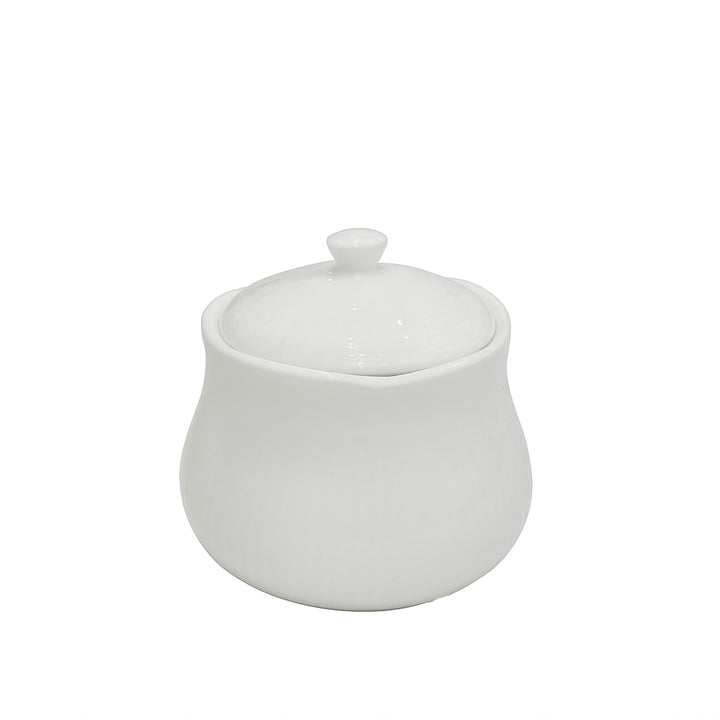 White ceramic sugar bowl with lid on a white background