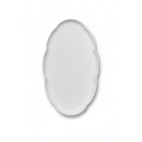 White ceramic plate on a white background