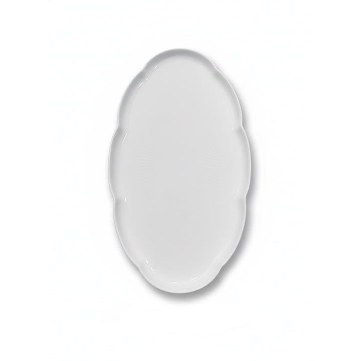 White ceramic plate on a white background