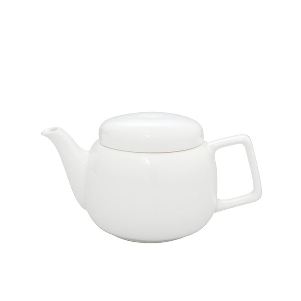White ceramic teapot on a white background