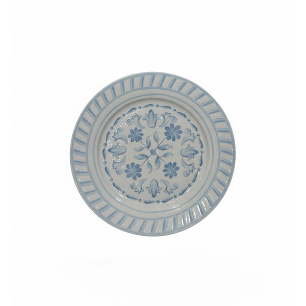 Decorative plate with floral pattern on a white background