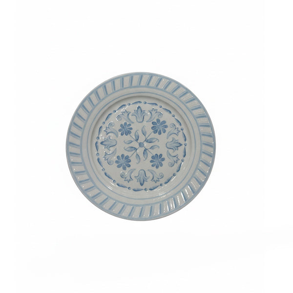 Decorative plate with floral pattern on a white background