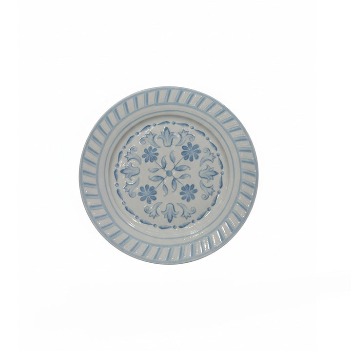 Decorative plate with floral pattern on a white background