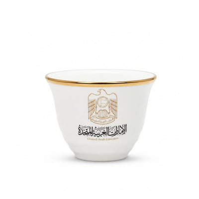 Elegant 12-Piece White Cawa Cup Set With A Refined Gold Rim And UAE Logo Design, Perfect For Serving Arabic Coffee During Gatherings And Special Occasions At Siddiq Gifts.