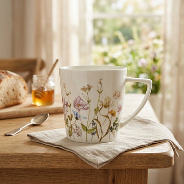 Elegant White Ceramic Mug With A 10 Oz / 280 Ml Capacity And Multicolor Floral Decal Design, Perfect For Serving Coffee, Tea, Milk, Hot Chocolate, And Other Beverages At Siddiq Gifts.