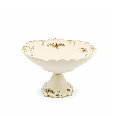 Elegant Cream Ceramic Round Fruit Bowl With A Raised Stand, Beautiful Floral Design, And Refined Gold Trim, Measuring 25 × 16 Cm And Ideal For Presenting Fruits, Sweets, Nuts, Snacks, And Treats At Siddiq Gifts.