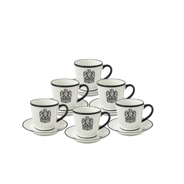 Set of six white coffee cups with black rims and black emblem on a white background