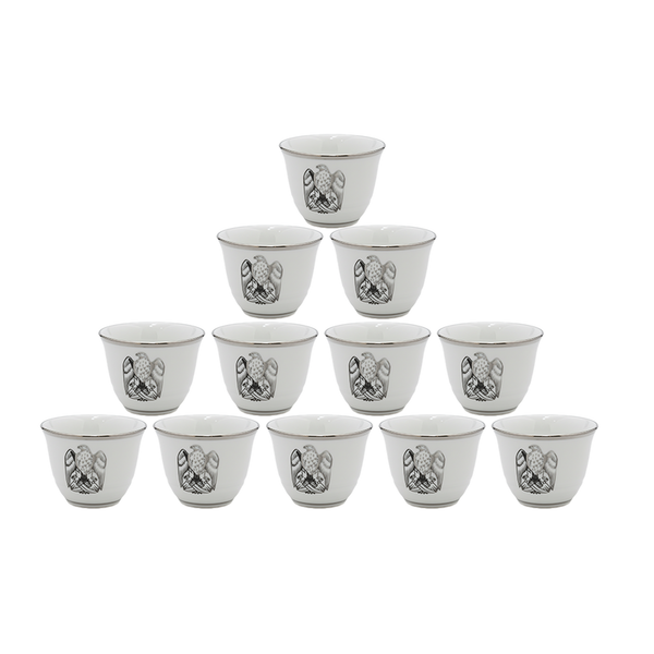 Set of twelve white ceramic cups with black decorative patterns on a white background