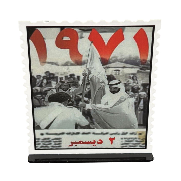 Memorabilia with a black and white photo of a man holding a flag, surrounded by text and numbers on a white background.