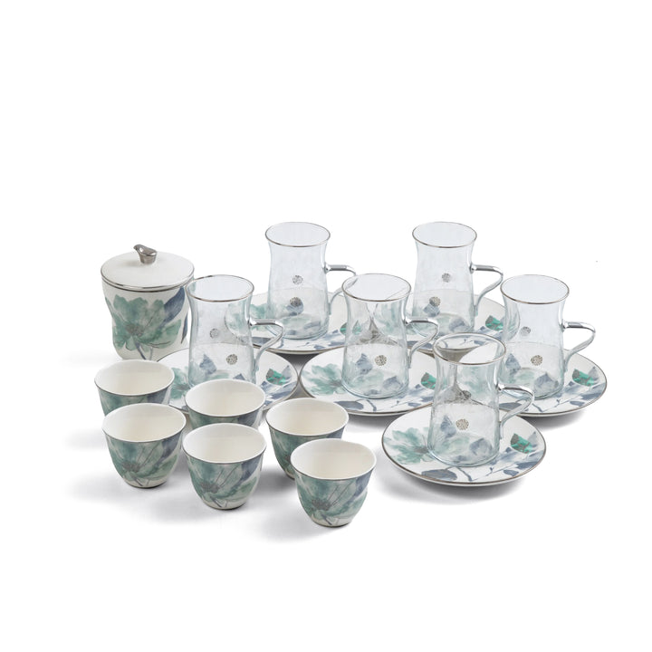 Tea set with cups, saucers, and a teapot on a white background