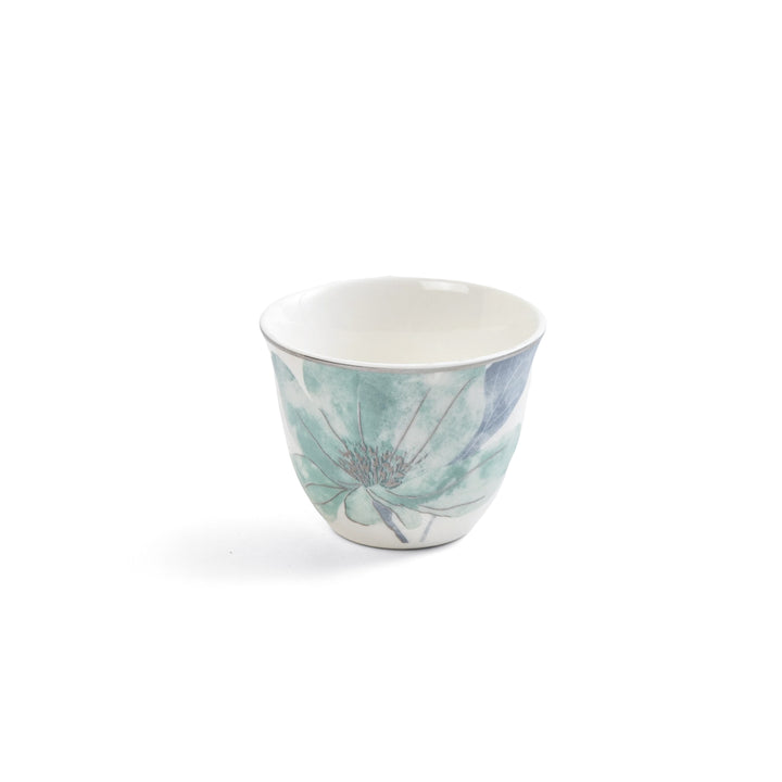 Ceramic cup with floral design on a white background