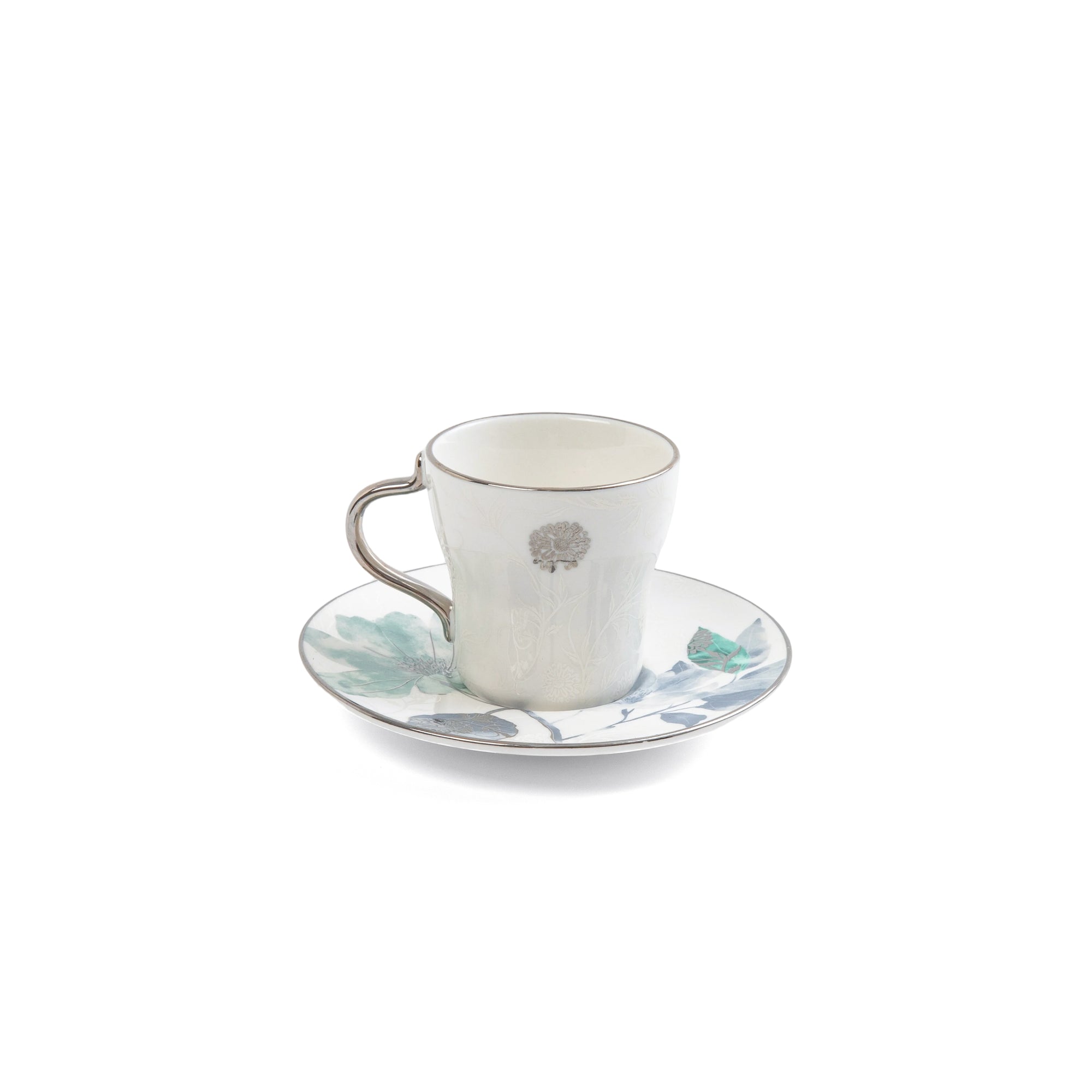 Ceramic cup and saucer with floral design on a white background