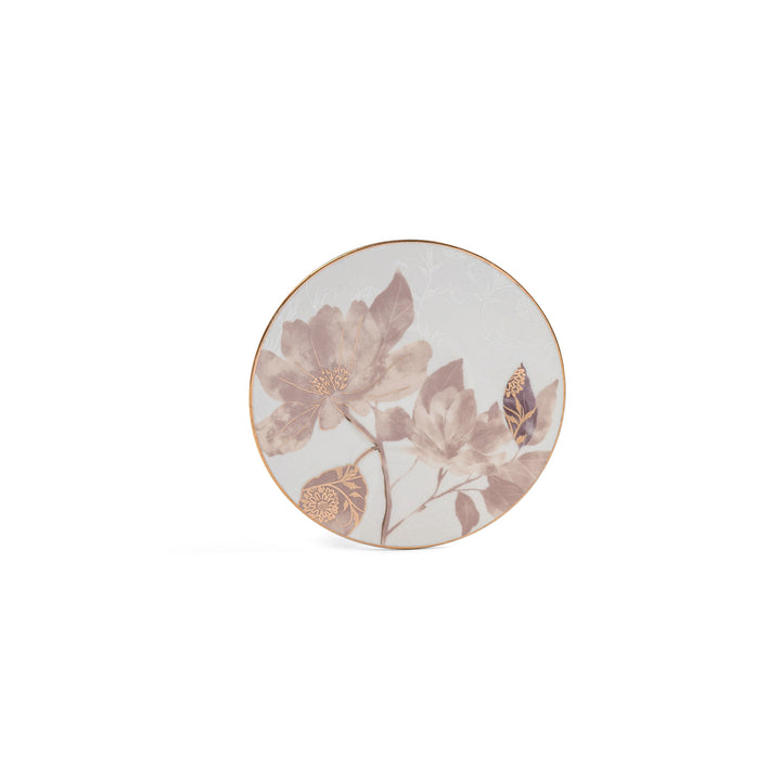 Round ceramic plate with floral design on a white background