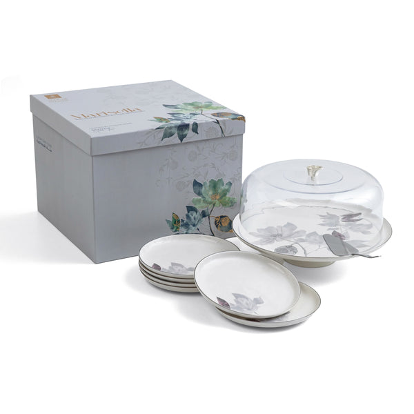 Set of ceramic dishes with a decorative box on a white background