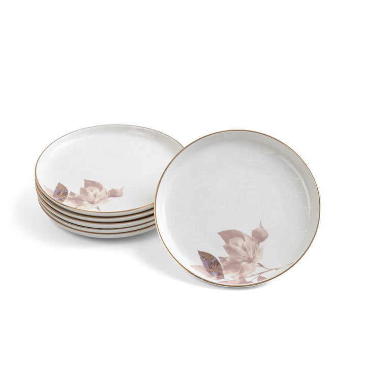 Set of ceramic plates with floral design on a white background