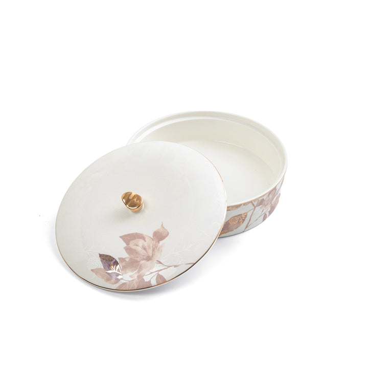 Decorative ceramic box with floral design on a white background