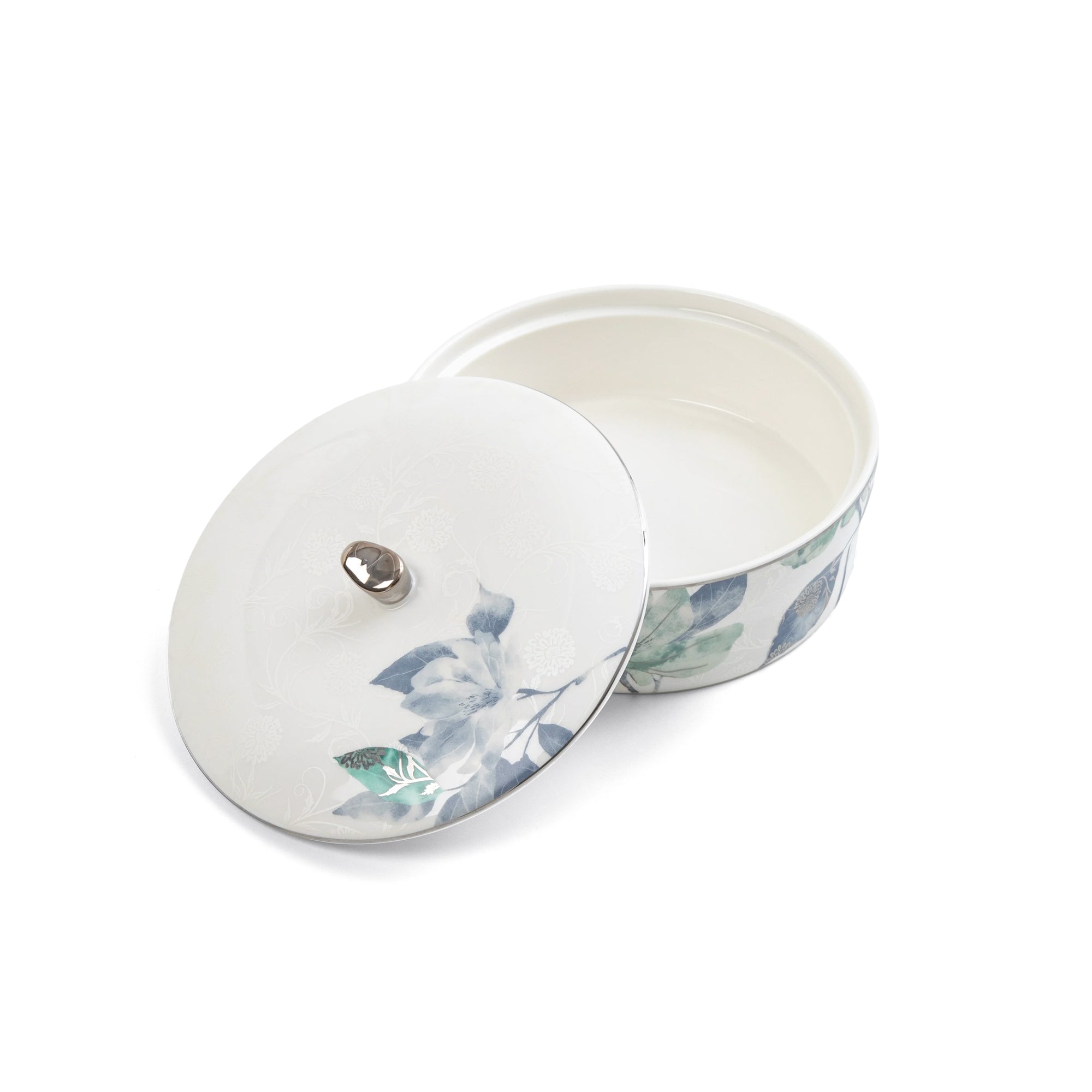 White ceramic container with floral design on a white background
