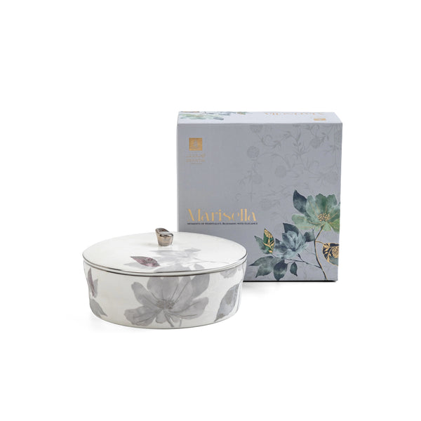 Decorative bowl with lid and packaging featuring floral design on a white background