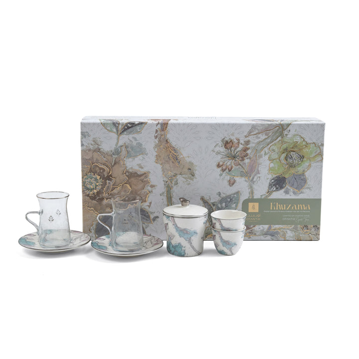Tea set with floral design packaging on a white background
