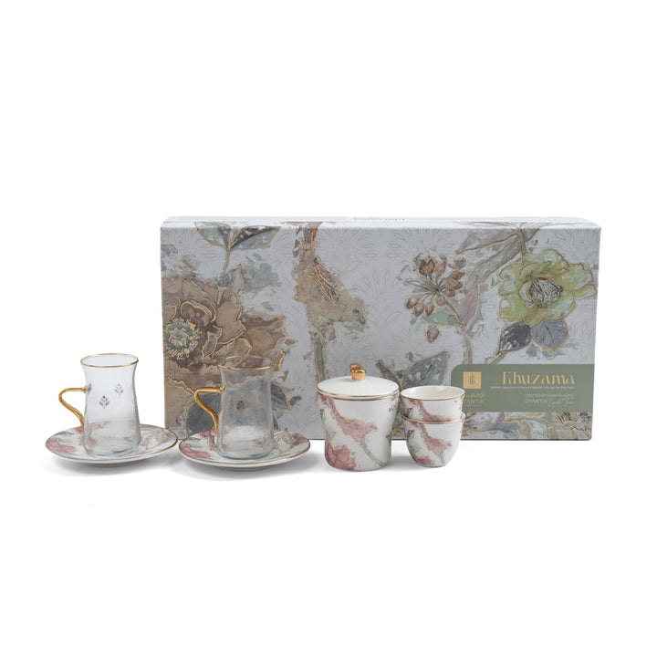 Tea set with floral design packaging on a white background