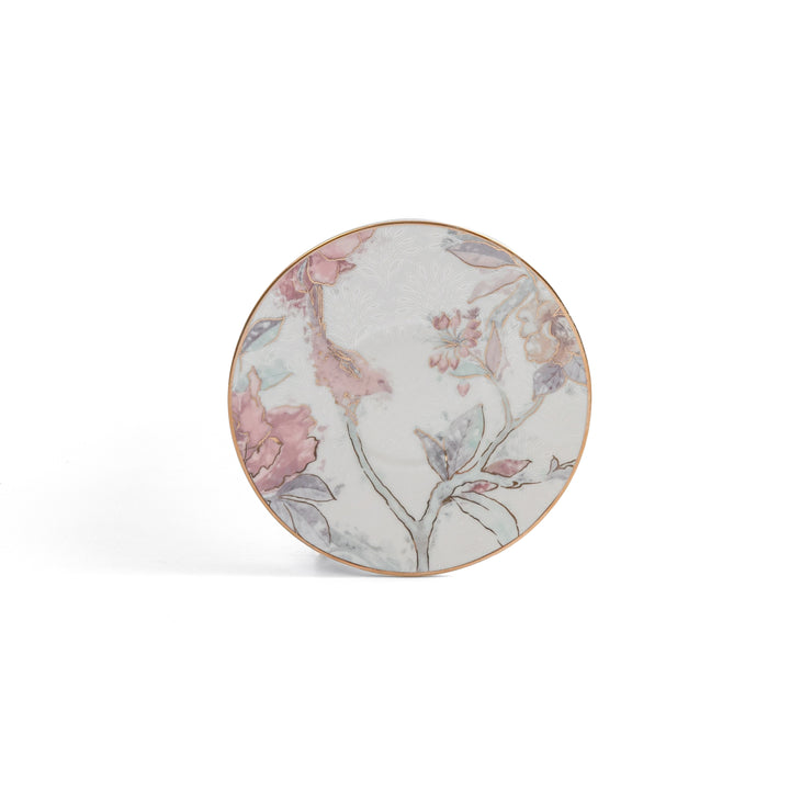 Round ceramic plate with floral design on a white background