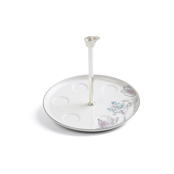 Decorative jewelry stand with floral design on a white background