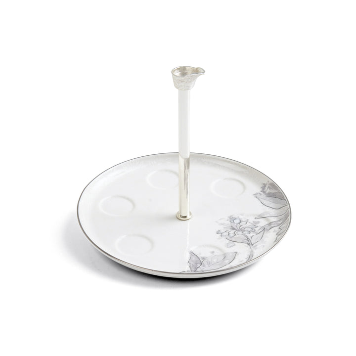 Decorative plate with floral design on a white background