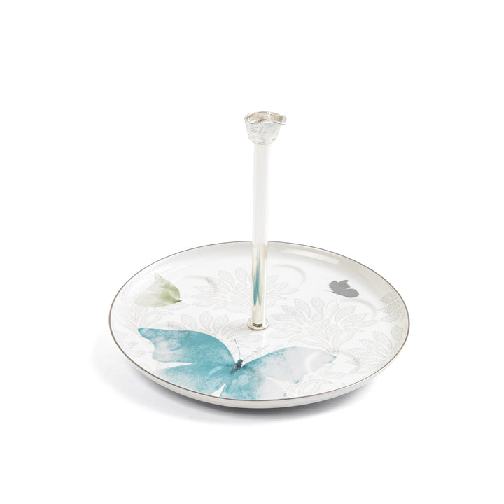 Round ceramic jewelry stand with butterfly design on a white background