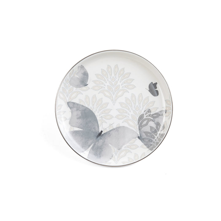 Decorative plate with butterfly and floral patterns on a white background