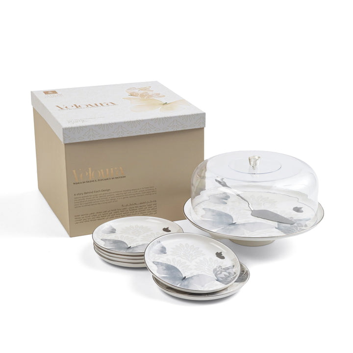 Set of ceramic plates with a decorative design on a white background, featuring the brand 'Le Faema'.