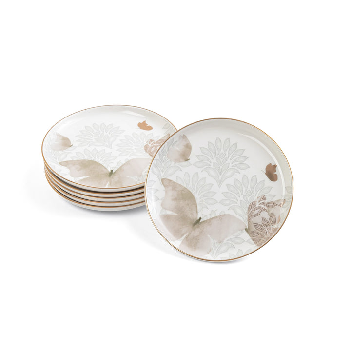 Set of ceramic plates with floral and butterfly design on a white background