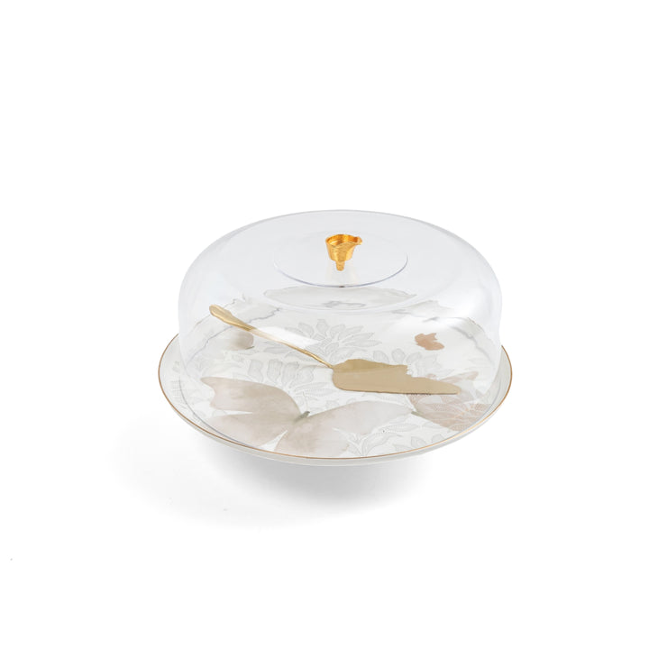 Decorative cake stand with marble design and gold accents on a white background