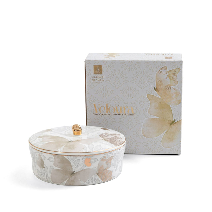Decorative ceramic bowl with lid and matching box featuring butterfly design on a white background