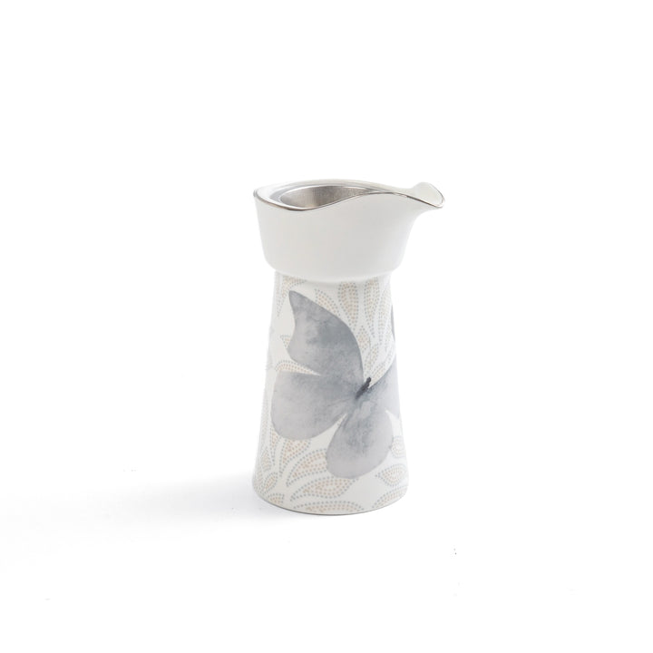 Marble-patterned creamer on a white background
