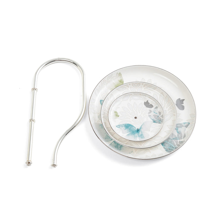 Silver earring with butterfly design on a white background