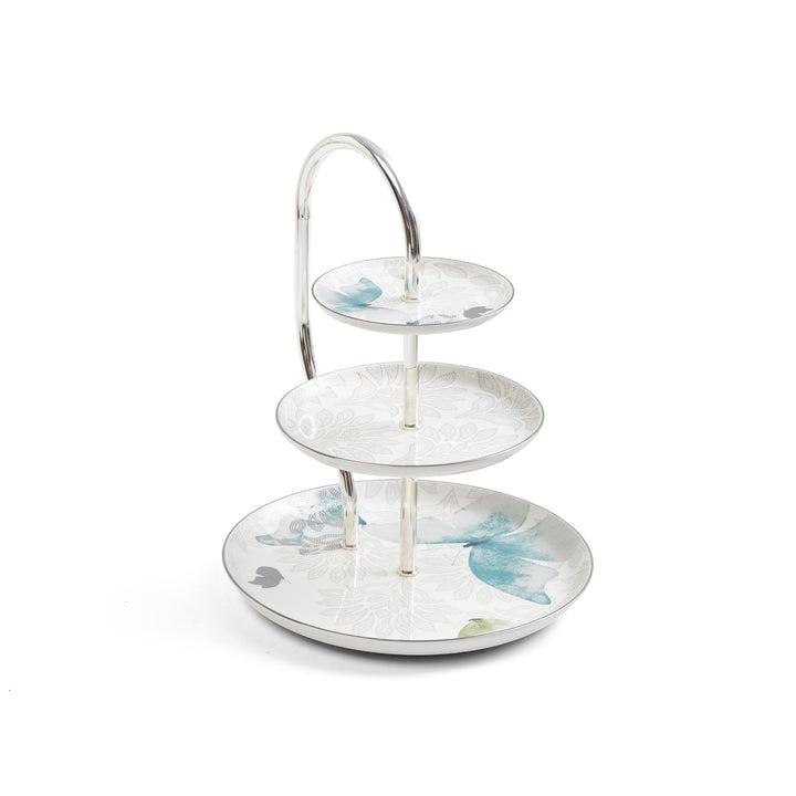 Three-tiered ceramic stand with butterfly design on a white background