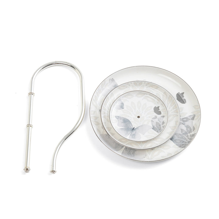 Silver earring with butterfly design on a white background