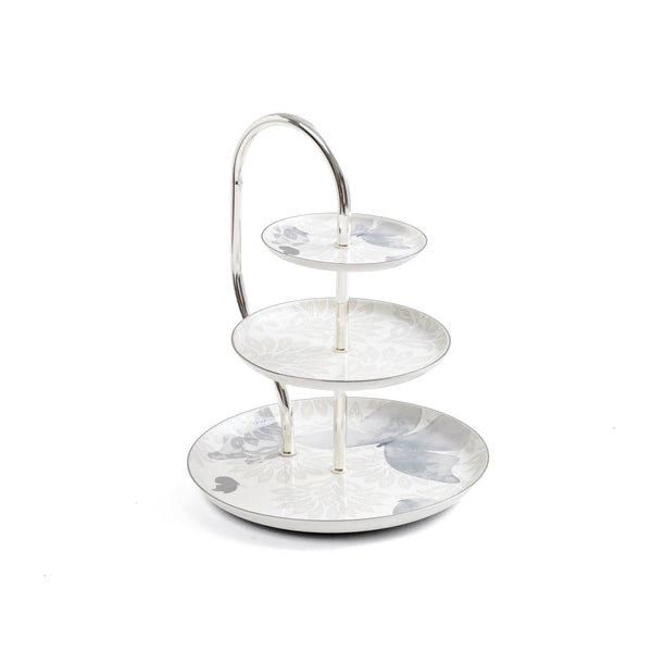Three-tiered marble serving tray on a white background