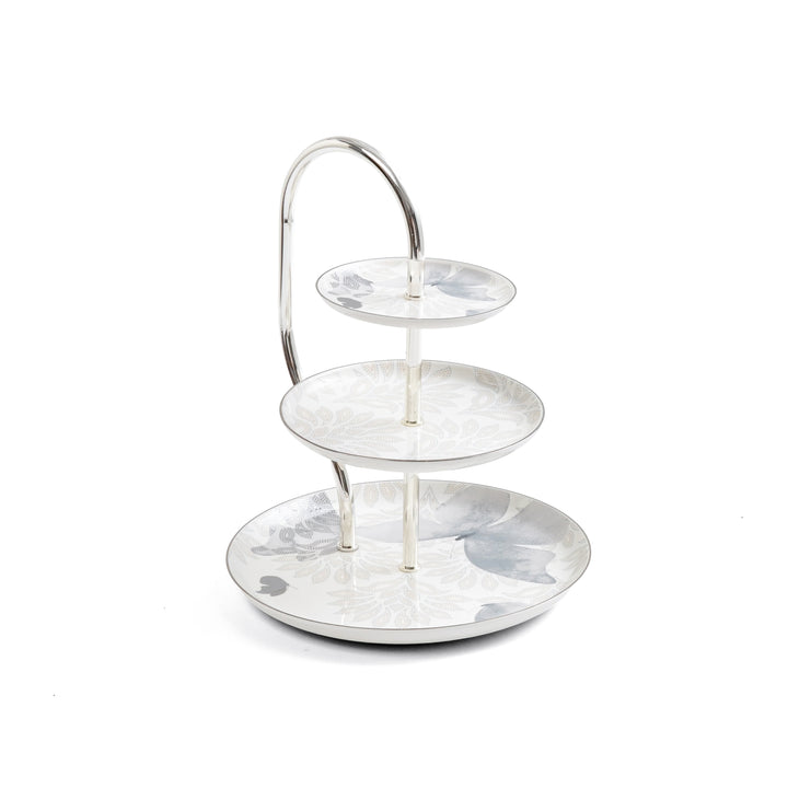 Three-tiered marble serving tray on a white background