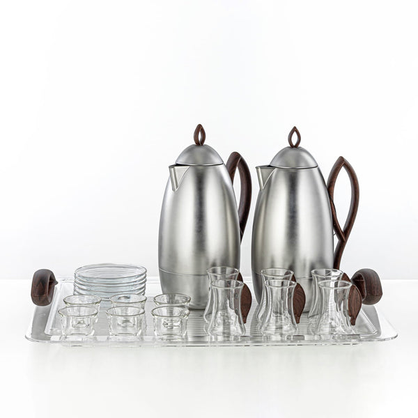 Stainless steel coffee service set with carafes, cups, and tray on a white background