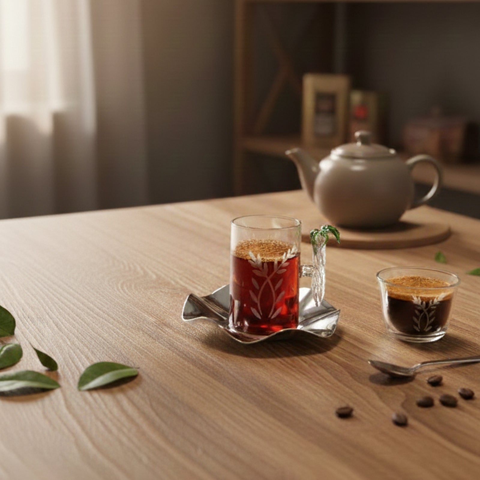 Tea set on a wooden table with a teapot, glass of tea, and small cup of coffee.