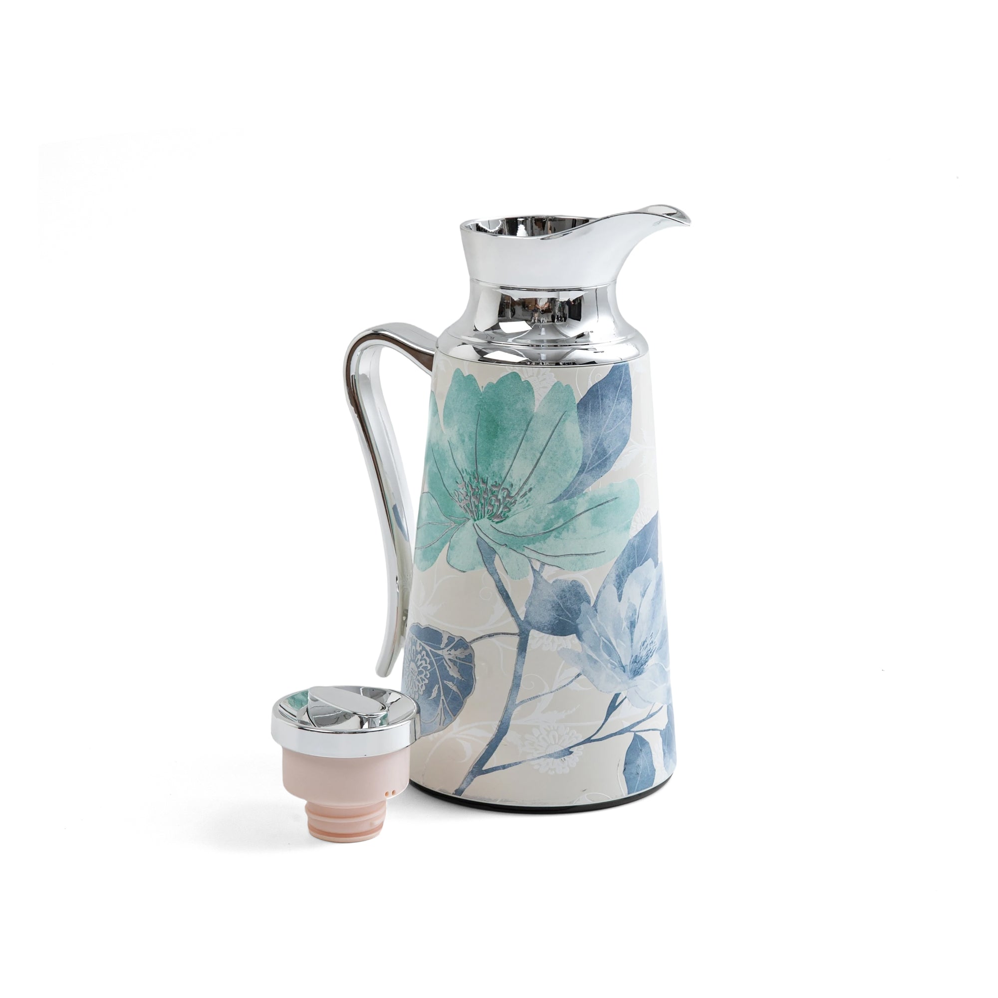 Decorative carafe with floral design on a white background