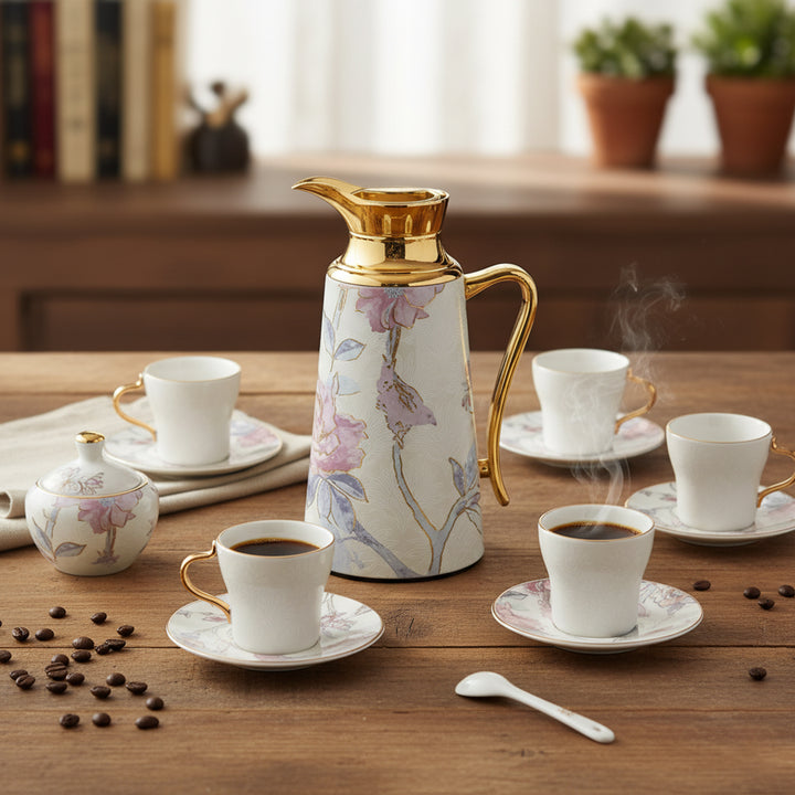 Ceramic coffee set with floral design on a wooden table