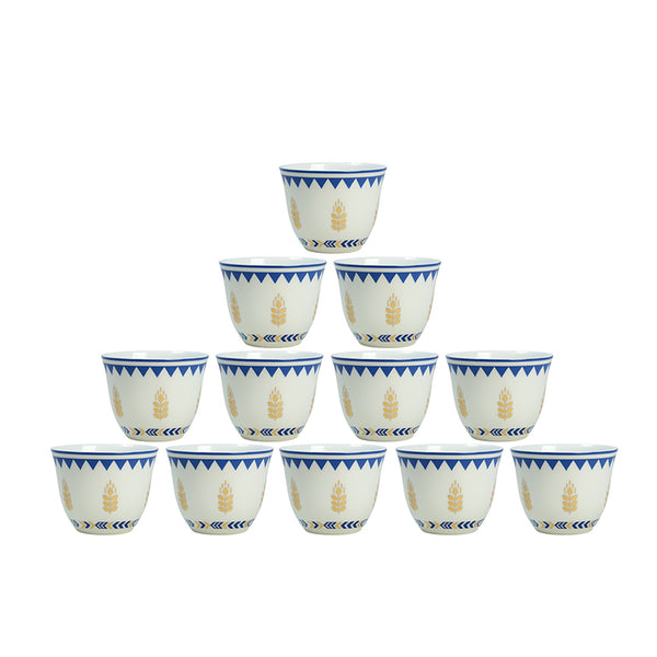 Set of twelve ceramic cups with blue and white patterns on a white background