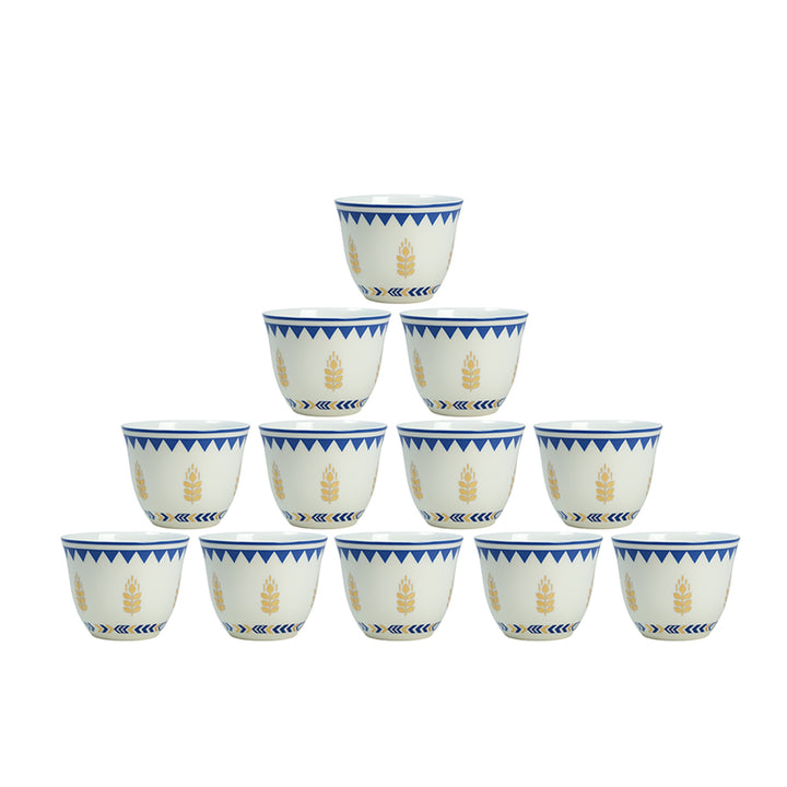 Set of twelve ceramic cups with blue and white patterns on a white background