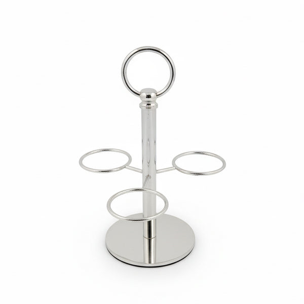 Silver metal drink holder with four circular shelves on a white background
