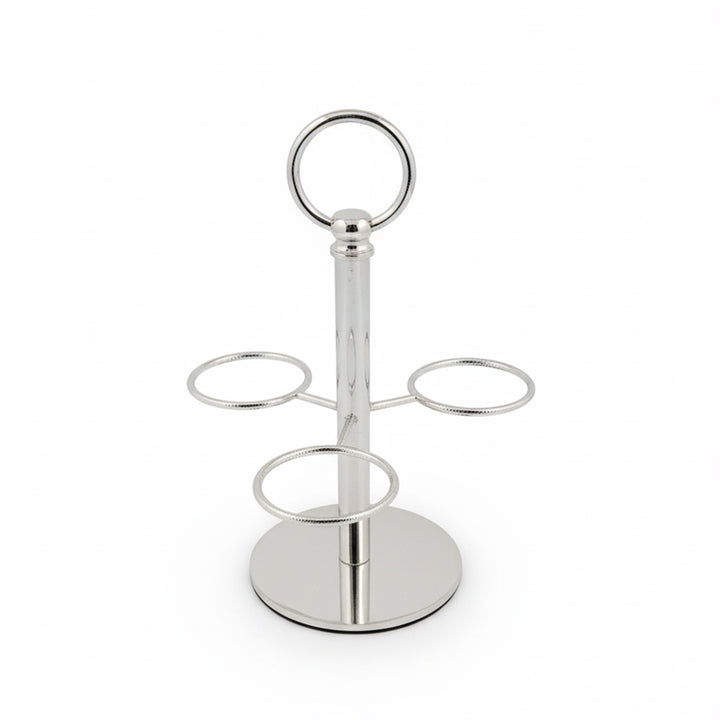 Silver metal drink holder with four circular shelves on a white background
