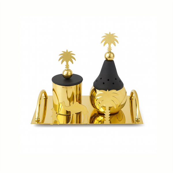 Gold and black decorative salt and pepper shakers with palm tree designs on a white background