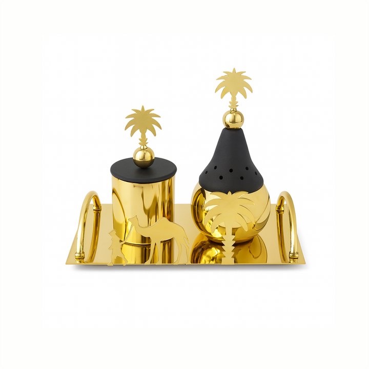 Gold and black decorative salt and pepper shakers with palm tree designs on a white background